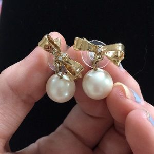 Gold bow pearl drop earrings